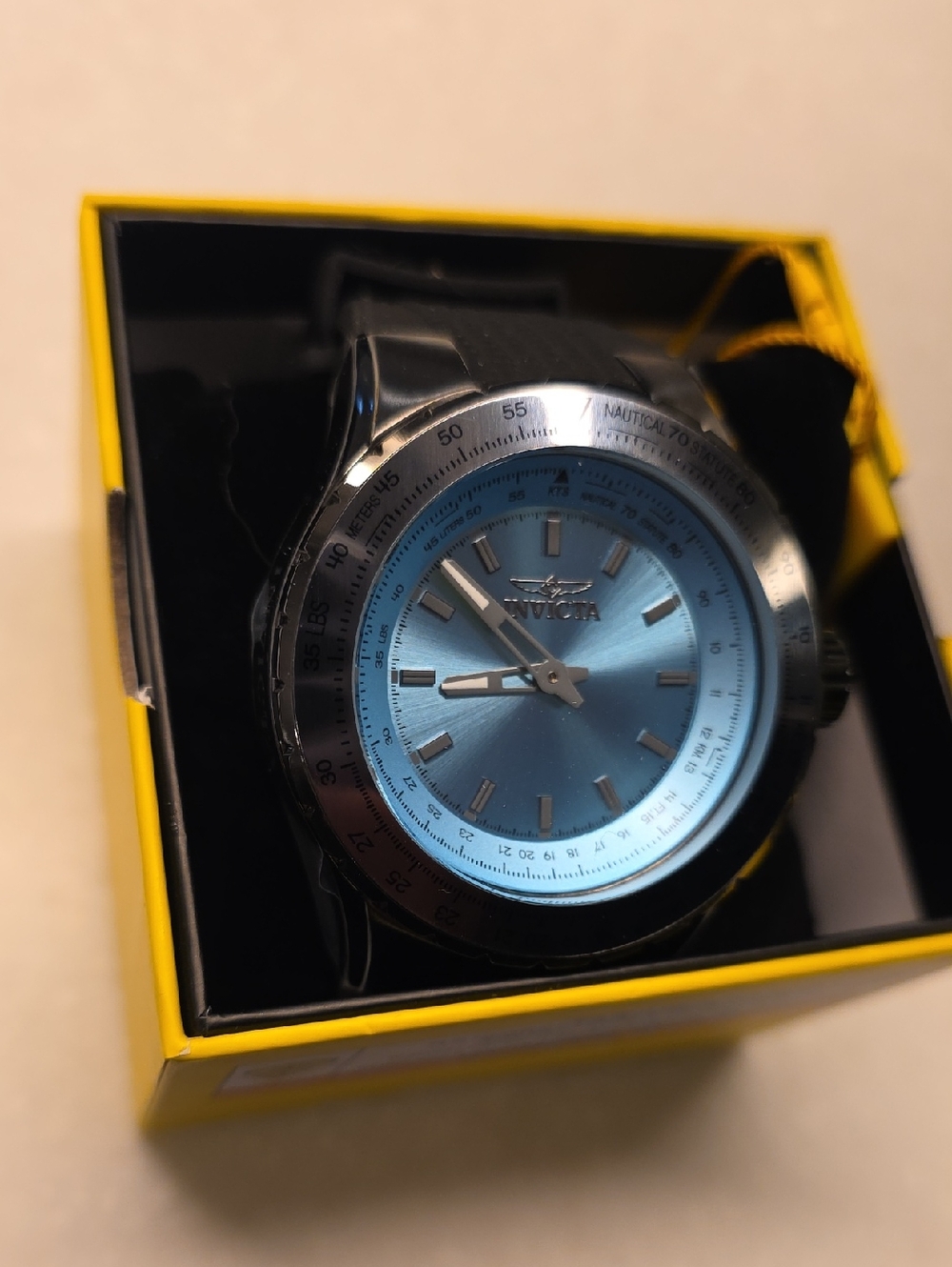 38. Invicta Light Blue Dial Stainless Case Black Strap Watch